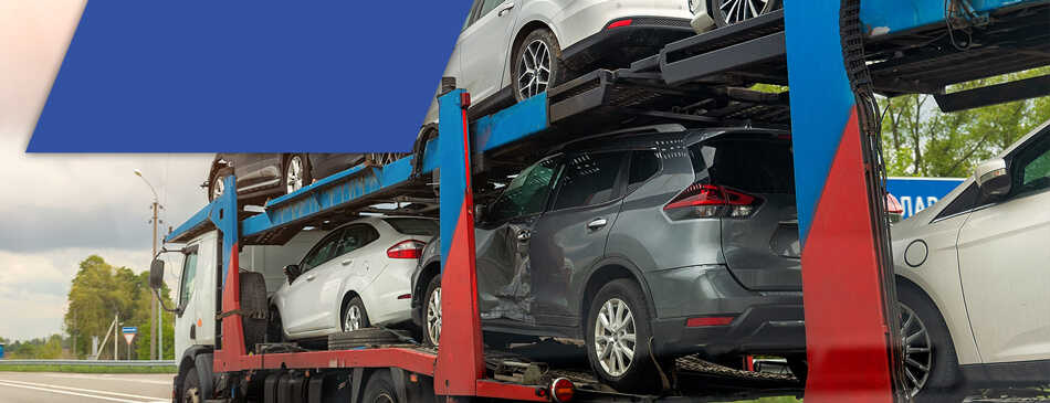 a trailer truck hauling cars