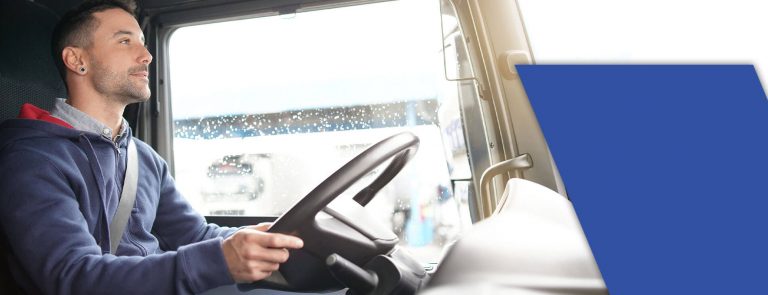 CDL student behind the wheel of a truck after taking CDL night classes.